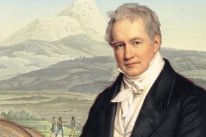 Alexander von Humboldt (J, Steler, 1843) vor einer Illustration aus einem seiner Werke